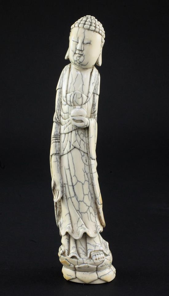 A Chinese ivory tusk carving of Buddha, Qing dynasty, 23.5cm.